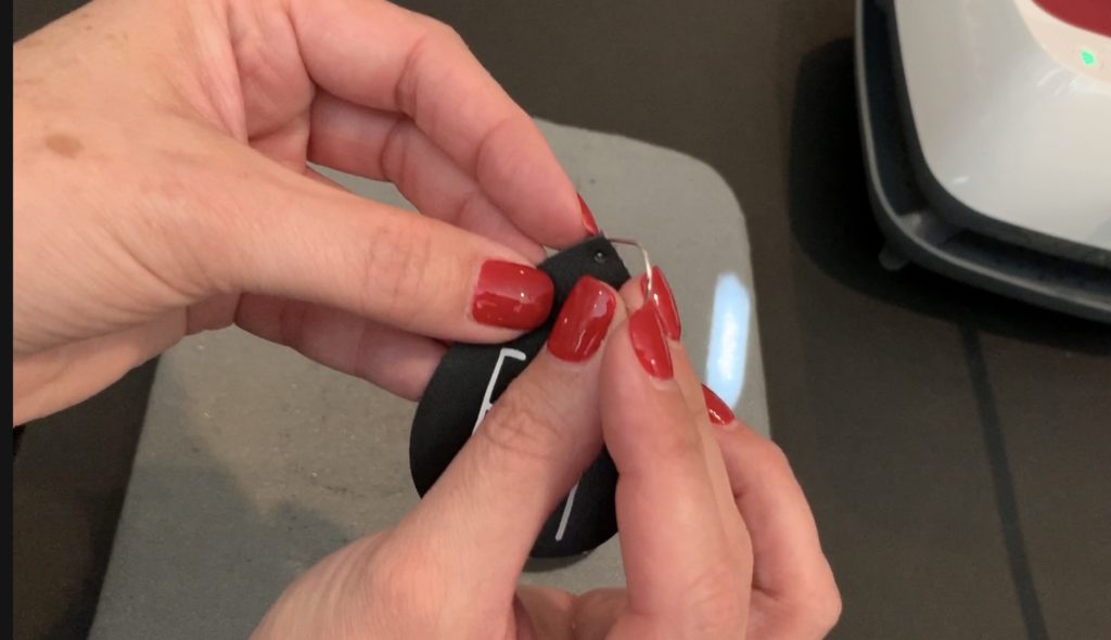 Putting hooks onto the Fri-Yay DIY Leather Earrings