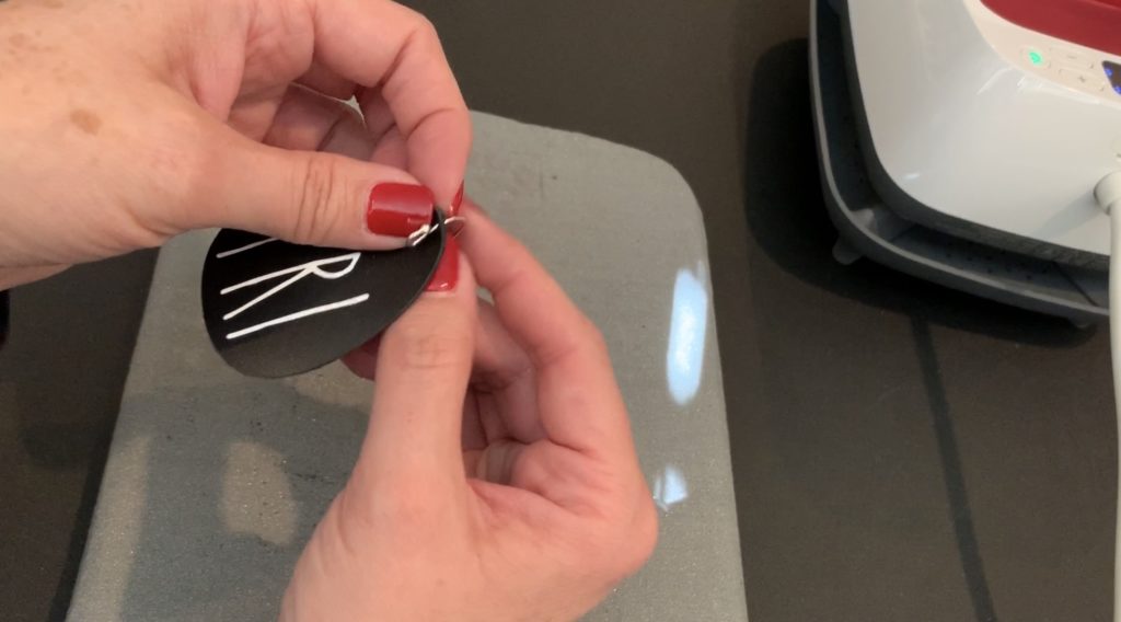 Putting hooks onto the Fri-Yay DIY Leather Earrings