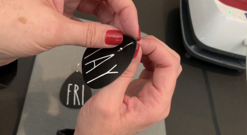Putting hooks onto the Fri-Yay DIY Leather Earrings
