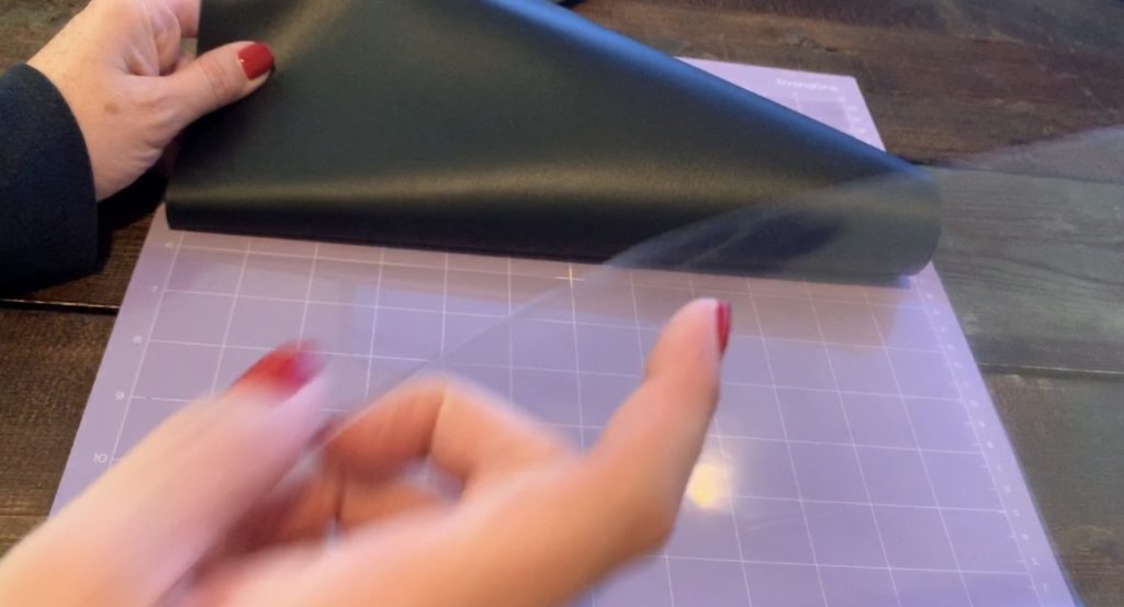 place genuine leather onto the Cricut strong grip mat with the good side facing down