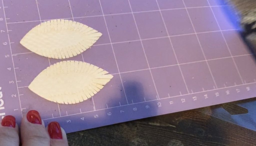 cutting fringe leaf leather earrings on Cricut Explore