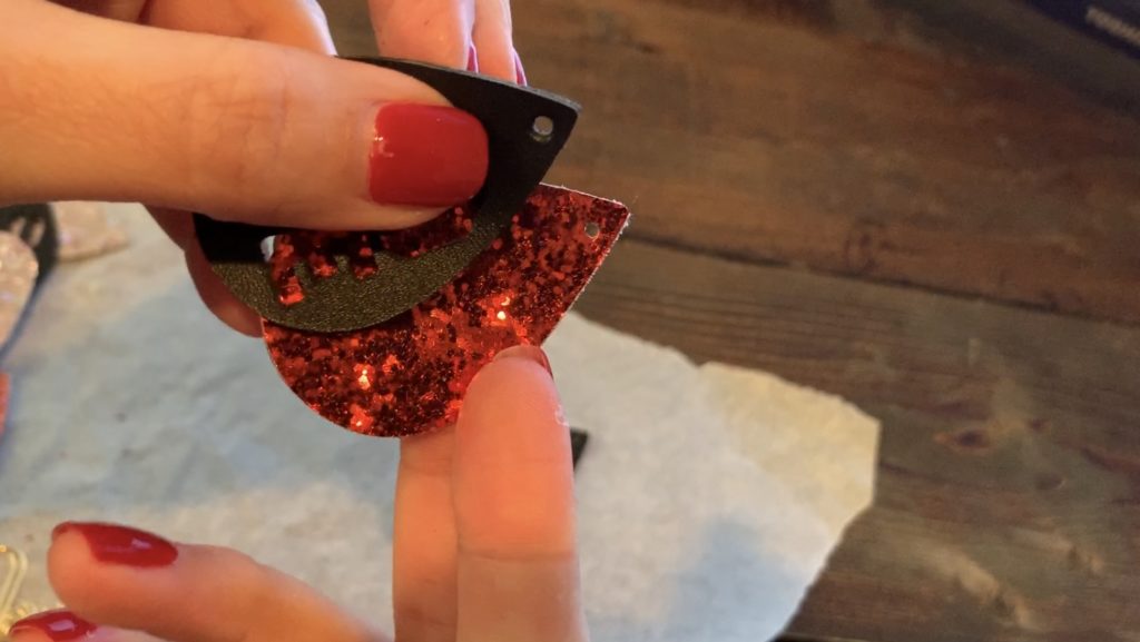 Punching holes in leather diy earrings for making LOVE earrings diy