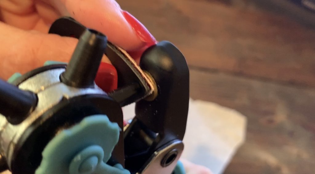 Punching holes in leather diy earrings for making LOVE earrings diy