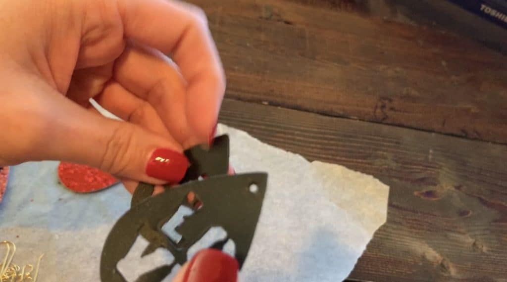 Punching holes in leather diy earrings for making LOVE earrings diy