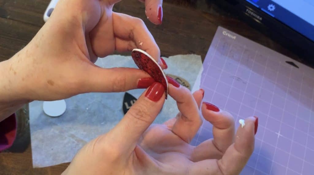 Glue two glitter faux leather earring pieces together to make Valentine's Earrings diy