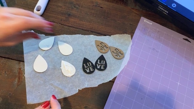 Glue two glitter faux leather earring pieces together to make Valentine's Earrings diy