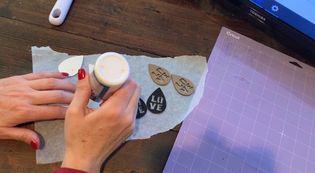 Glue two glitter faux leather earring pieces together to make Valentine's Earrings diy