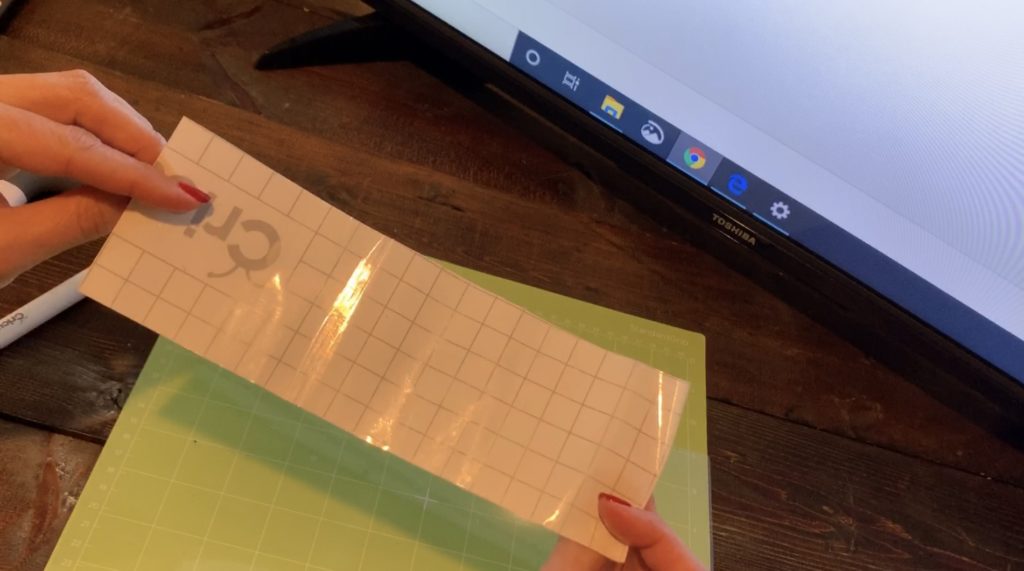 Cricut transfer paper on a Cricut mat before putting the glitter faux leather on the mat, to help it from making a mess on the mat