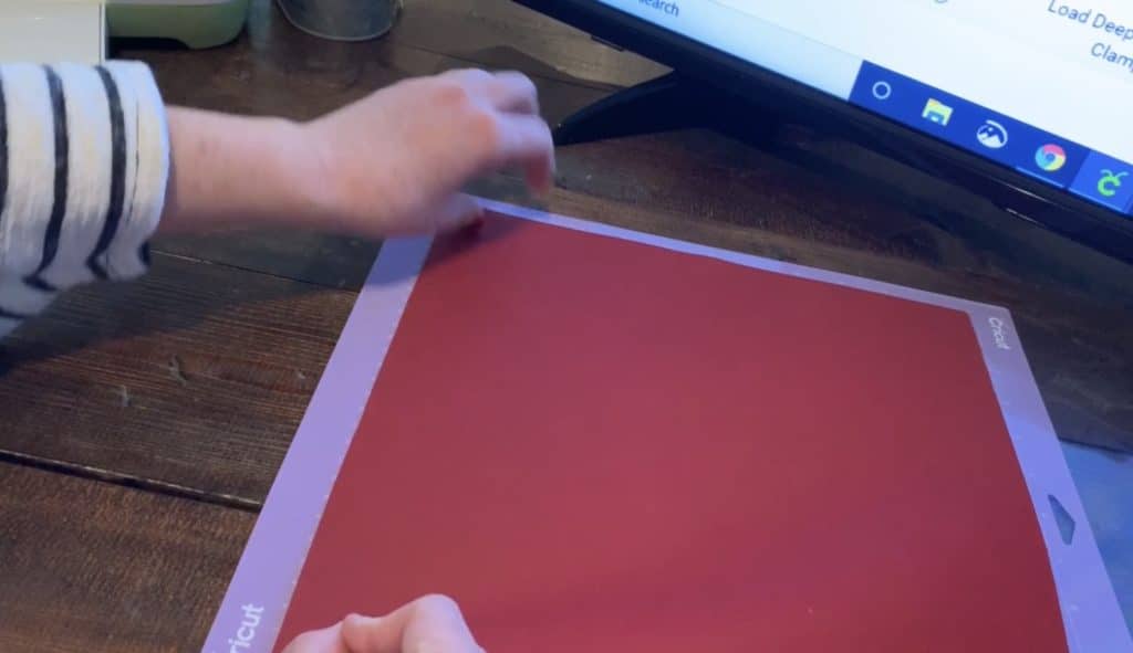 leather placed upon cricut cutting mat