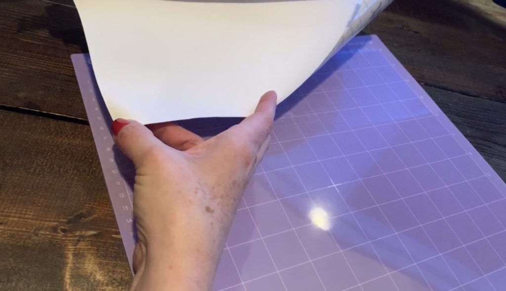 strong grip transfer tape on a Cricut mat, used to protect the mat from leather fibers