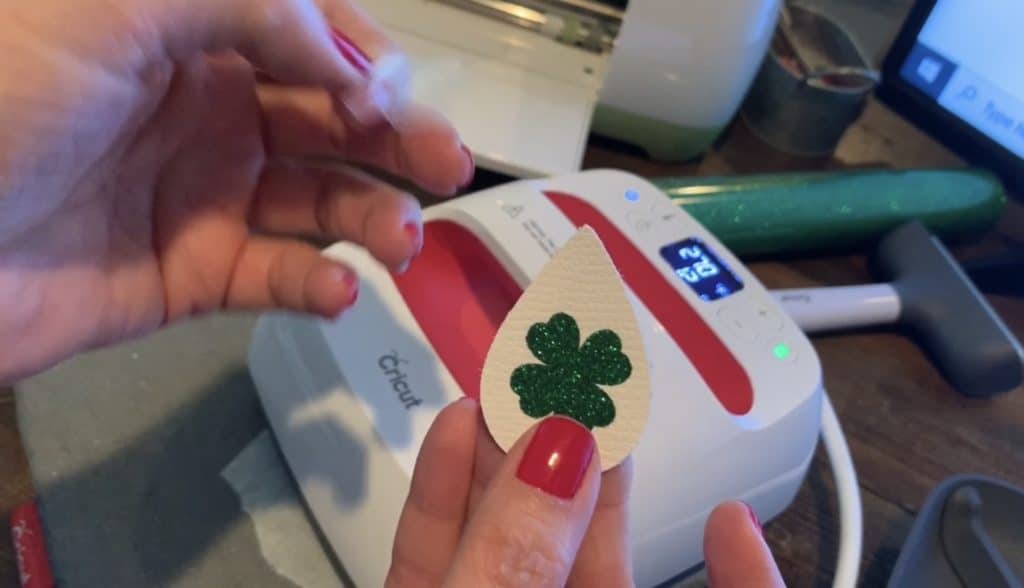 removing the backing from the shamrock iron on