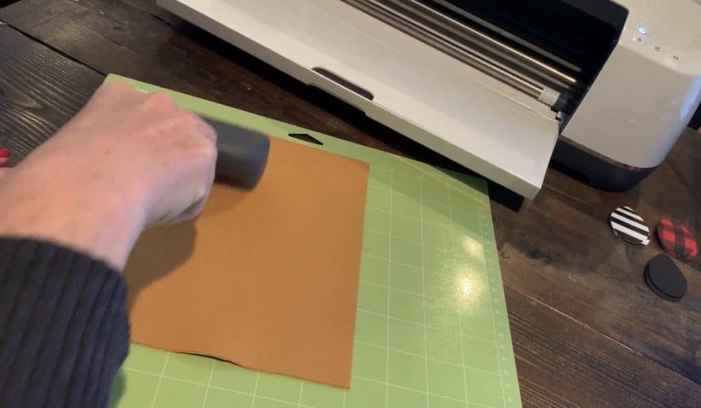 cutting hobby lobby leather diy earrings on a Cricut