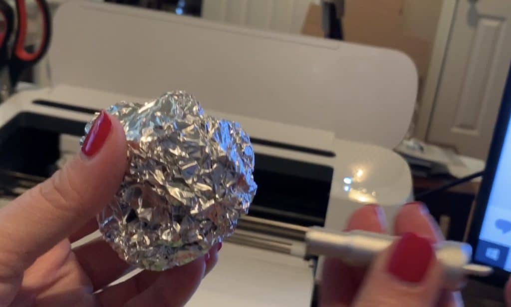 cleaning cricut blade with aluminum foil ball