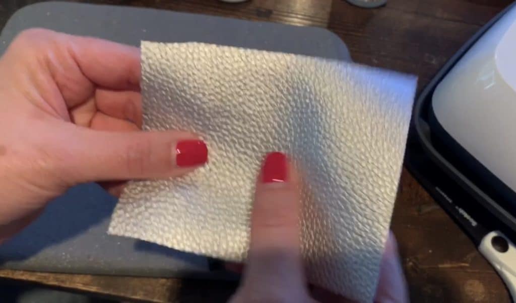 heat transfer vinyl on back of Hobby Lobby faux leather