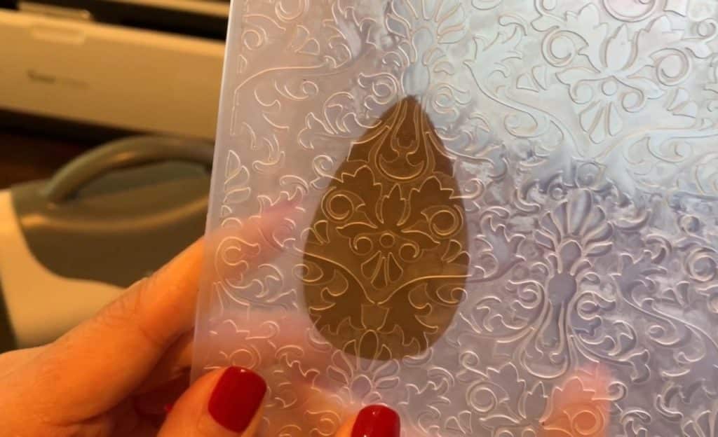 diy leather earring in an embossing folder