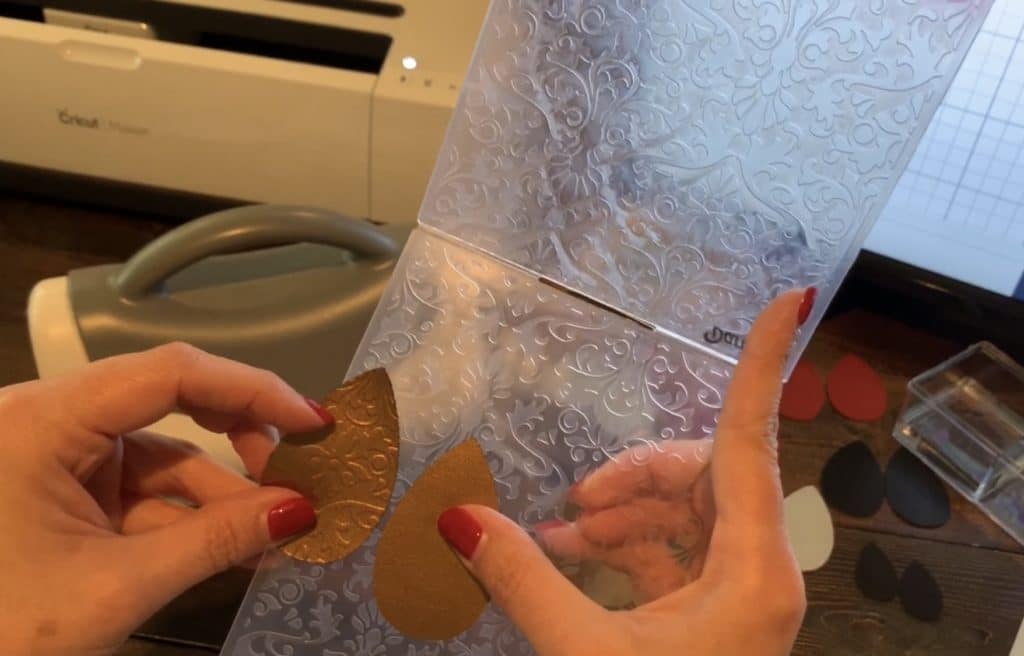 embossing folder with embossed leather earrings