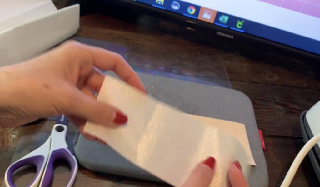 applying Heat n Bond to the back of Hobby Lobby faux leather