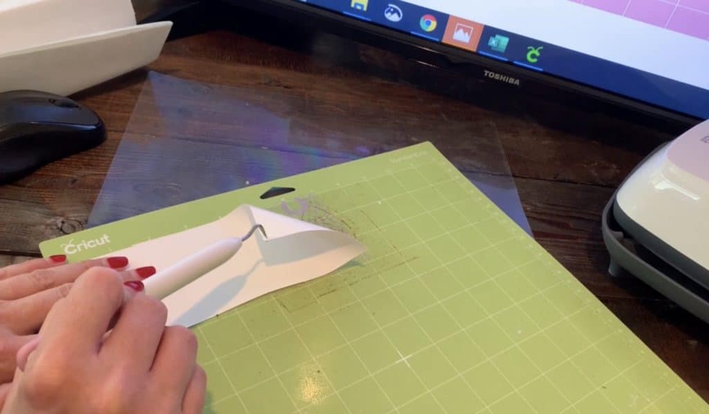 pulling backing off of the transfer tape