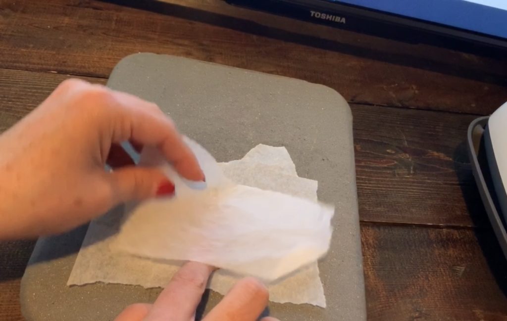 diy leather earrings on parchment paper