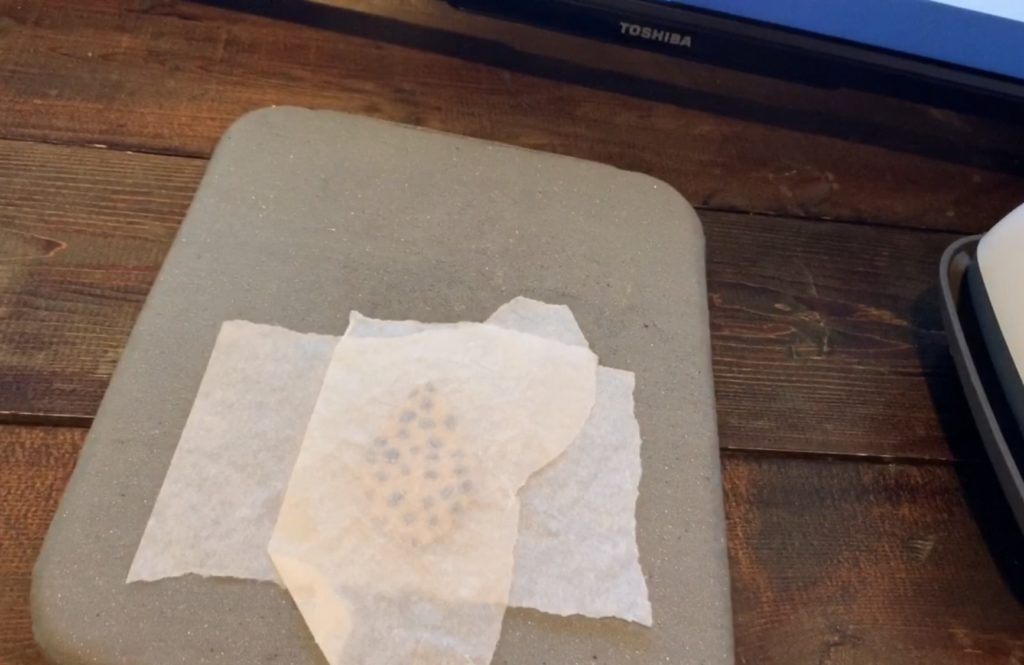 Parchment paper on faux leather earring diy project