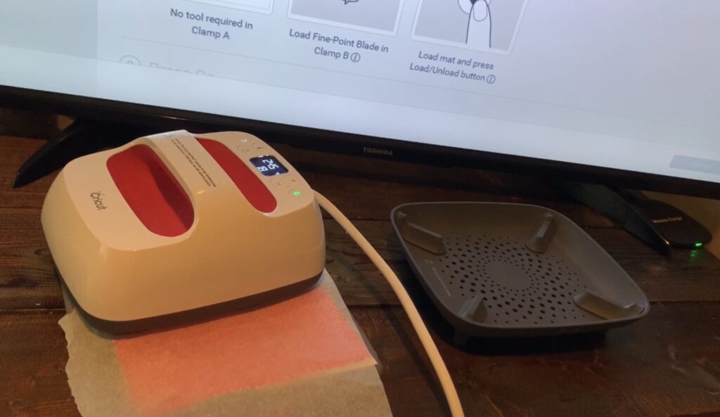 parchment paper on faux leather earrings before the Cricut Easy Press is placed on