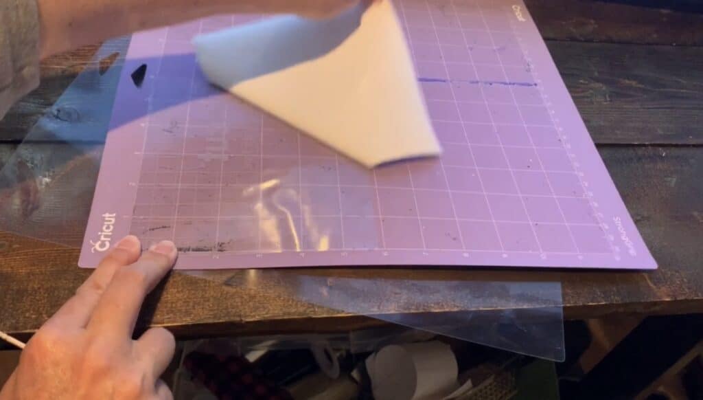 pulling backing off of the strong grip transfer tape