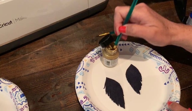 painted feather leather earrings