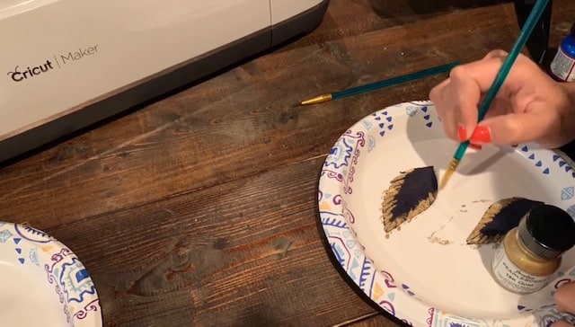 painted feather leather earrings