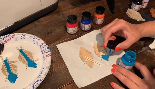 painted feather leather earrings