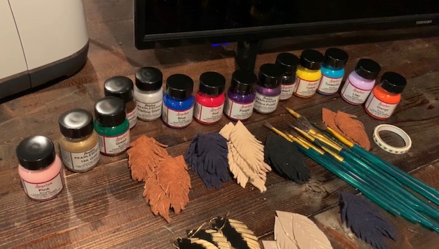 painted feather leather earrings