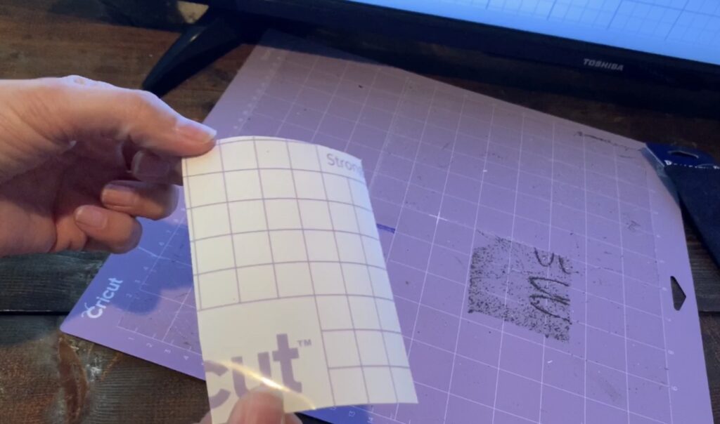 contact paper onto the mat