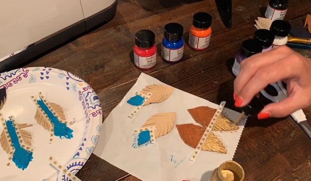 painted feather leather earrings