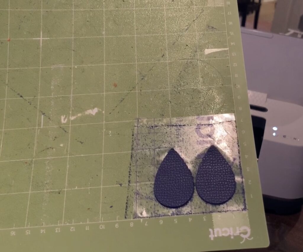 cutting blue teardrops for 4th of july earrings