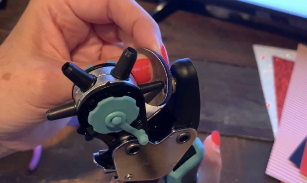 cutting holes in pinched leather earrings