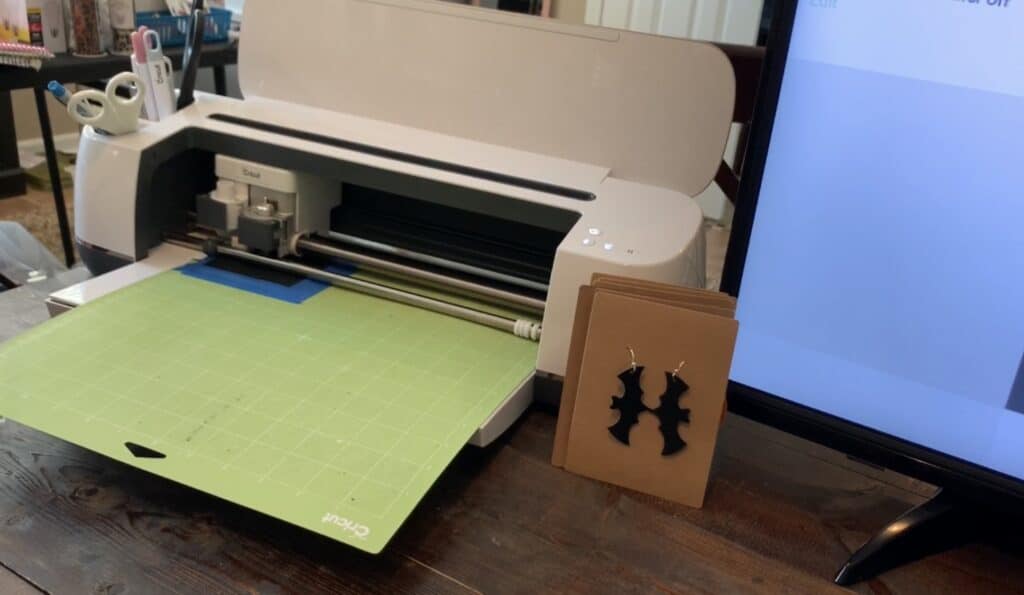 bat faux leather earrings, with bat cut from Cricut Maker