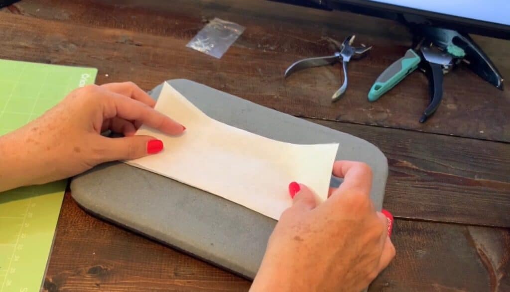 putting heat n bond on the back of the faux leather