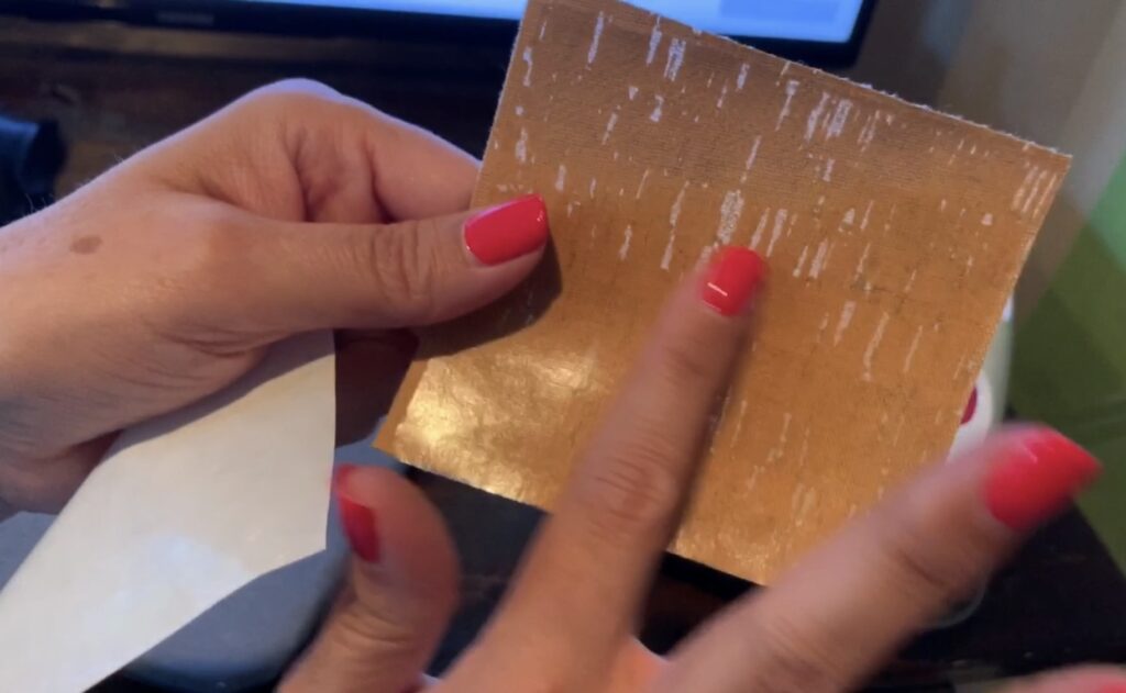 putting heat n bond on back of hobby lobby cork for faux leather earrings