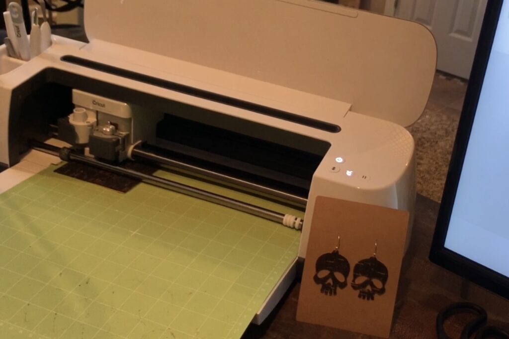 cutting halloween earrings on a Cricut machine