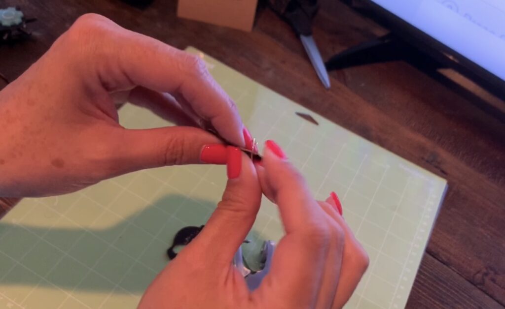 putting hook onto skull earrings diy