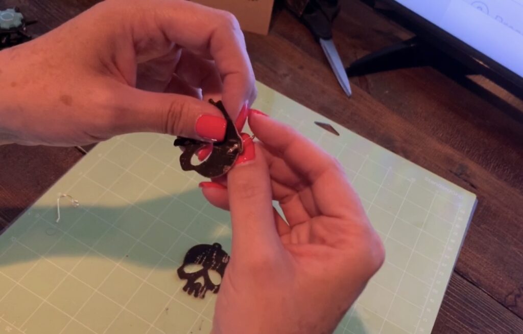 putting hook onto skull earrings diy