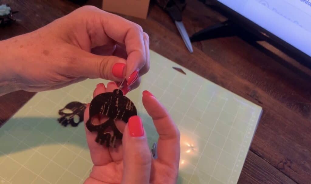 putting hook onto skull earrings diy