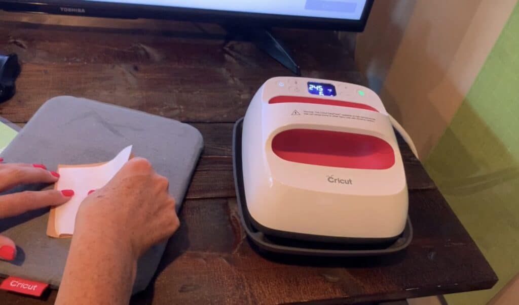 putting heat n bond on back of hobby lobby cork for faux leather earrings