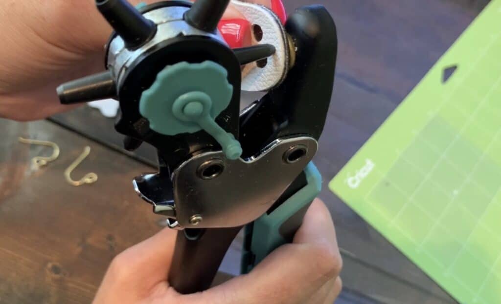 cutting hole in leather earrings diy project