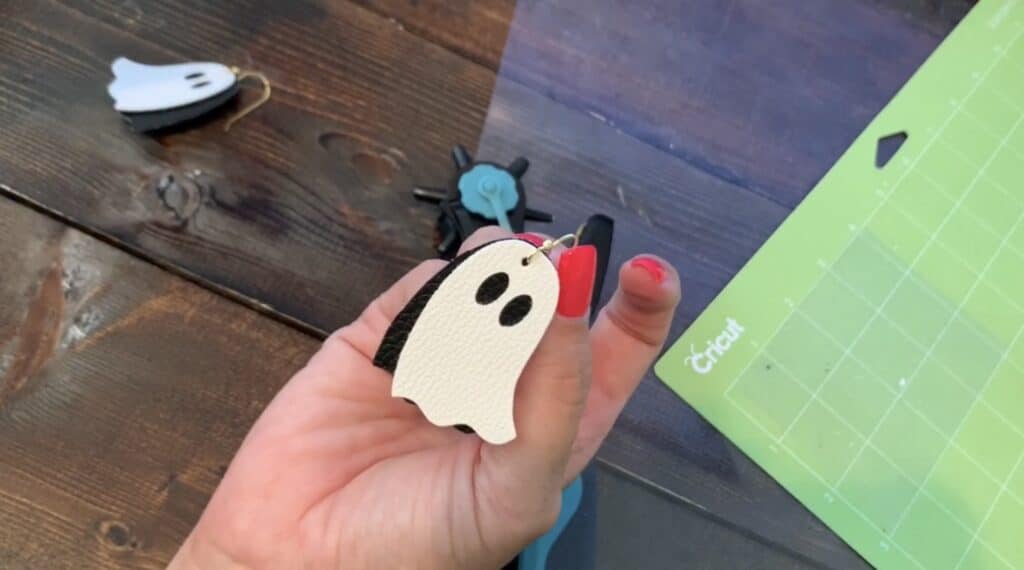 cutting hole in leather earrings diy project