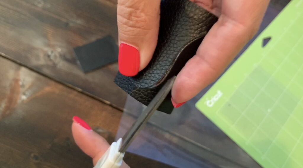 cutting Halloween faux leather earrings