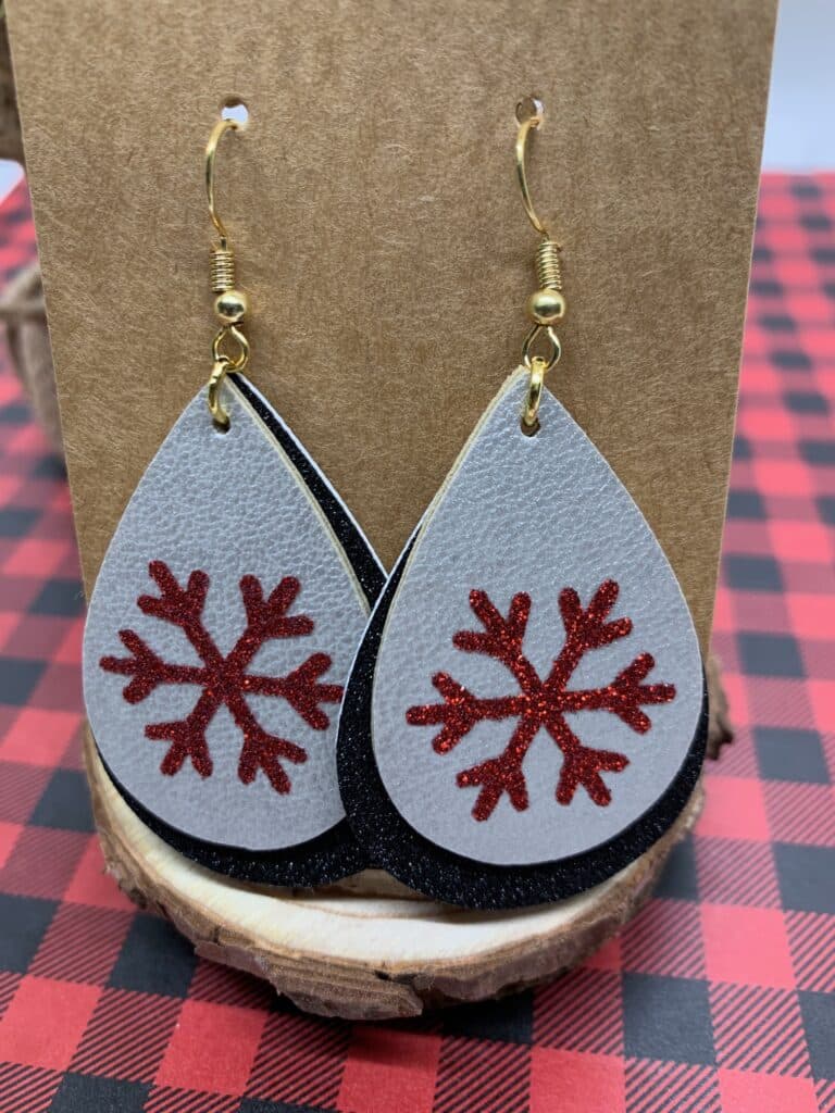 faux leather snowflake earrings with double sided silver faux leather and black fine glitter faux leather