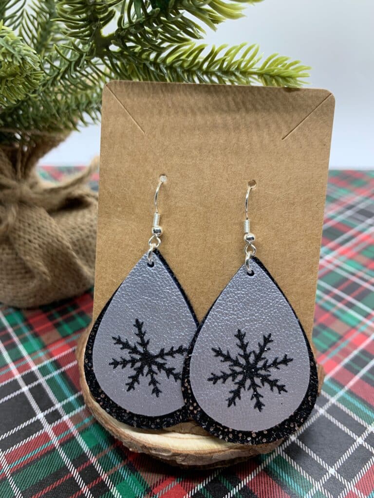 silver double sided faux leather and black and silver speckled faux leather on holiday faux leather earrings