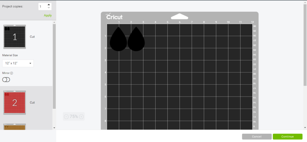 reindeer faux leather earrings on a Cricut mat, ready to cut