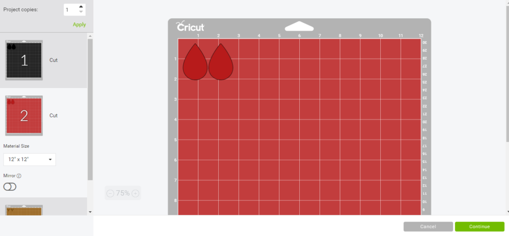 reindeer faux leather earrings on a Cricut mat, ready to cut