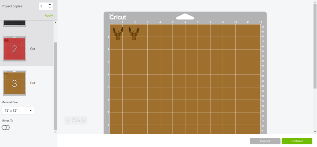 reindeer faux leather earrings on a Cricut mat, ready to cut